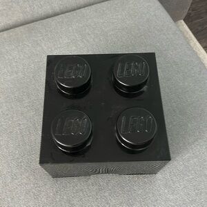 Black Lego box and pieces